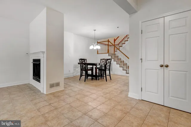 a view of a hallway with seating area