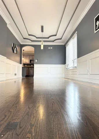 a view of a kitchen with a sink and microwave