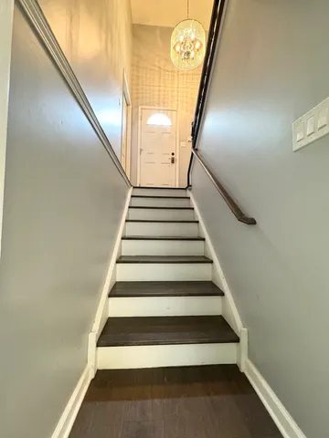a view of a chairs on the roof deck