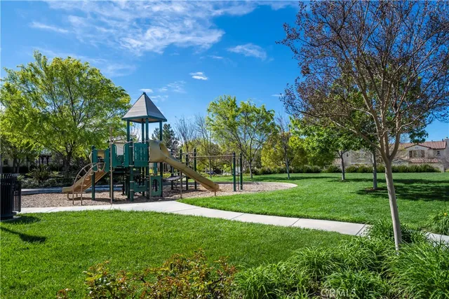 a view of a garden and basketball court