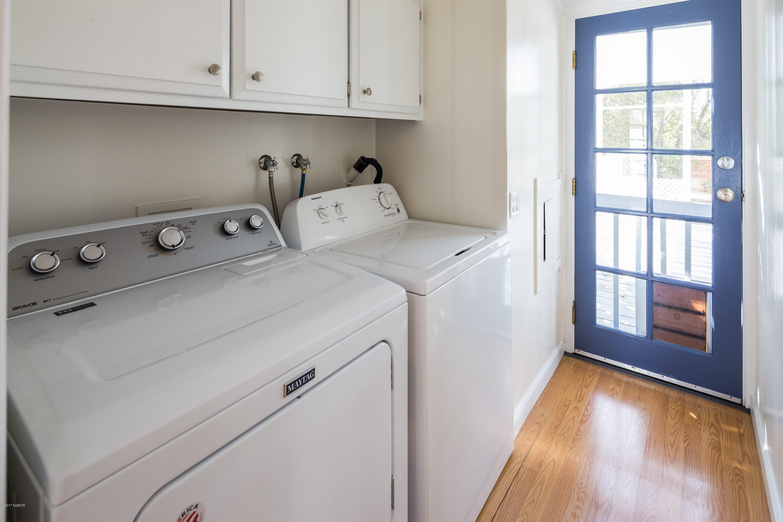 2075 North Refugio Road Santa Ynez, CA 93460 - Photo 29 of 46 a utility room with dryer and washer