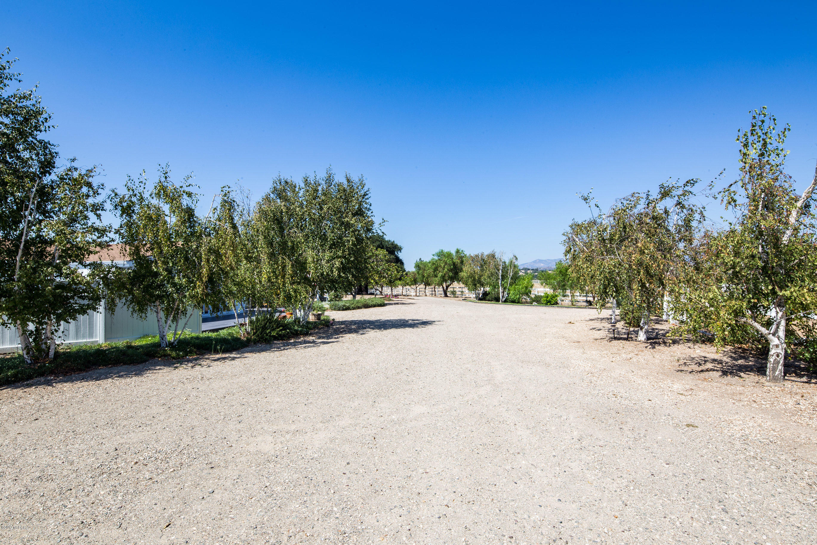 2075 North Refugio Road Santa Ynez, CA 93460 - Photo 33 of 46 a view of a road with a yard
