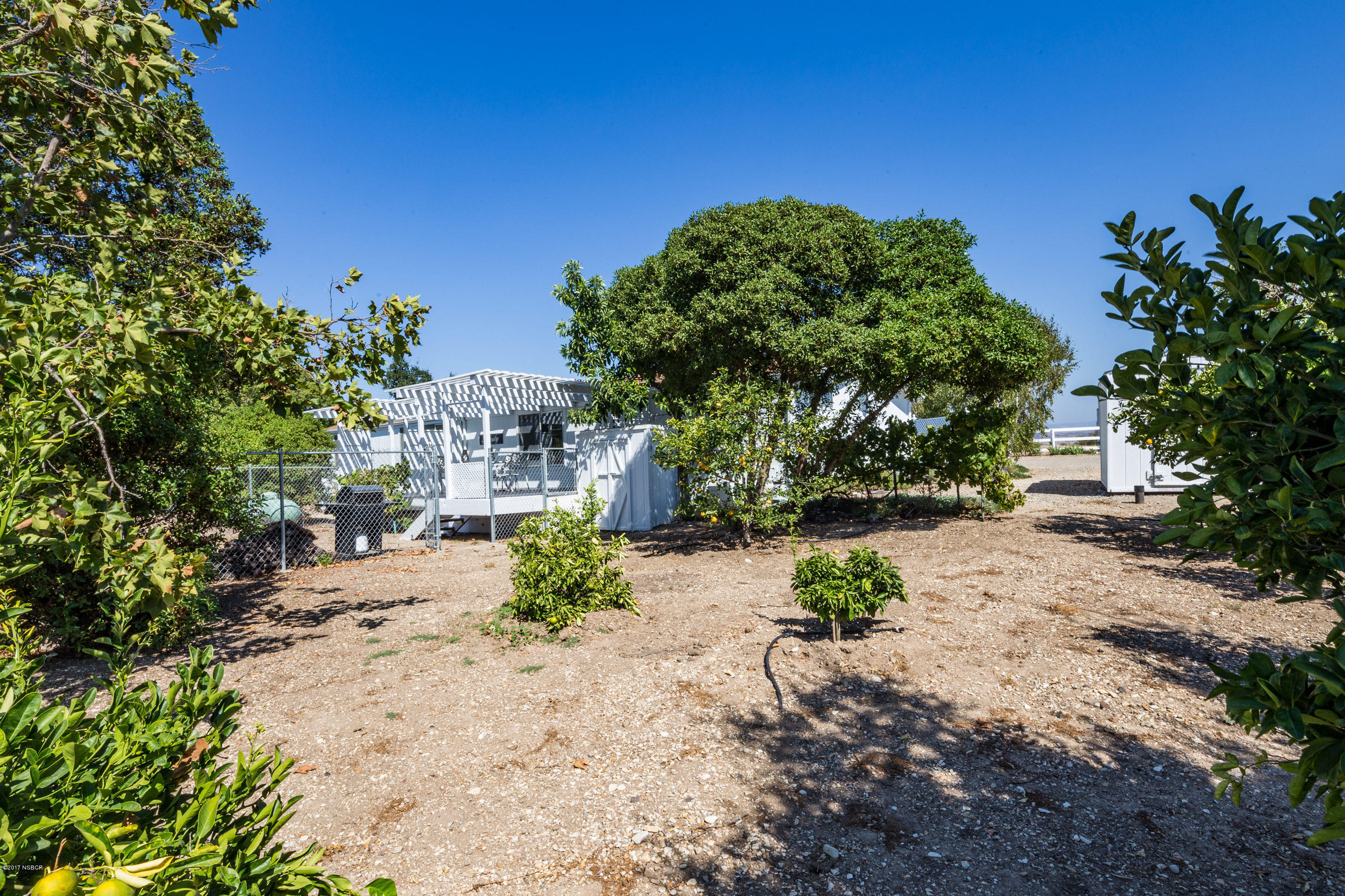 2075 North Refugio Road Santa Ynez, CA 93460 - Photo 34 of 46 a view of a yard with plants