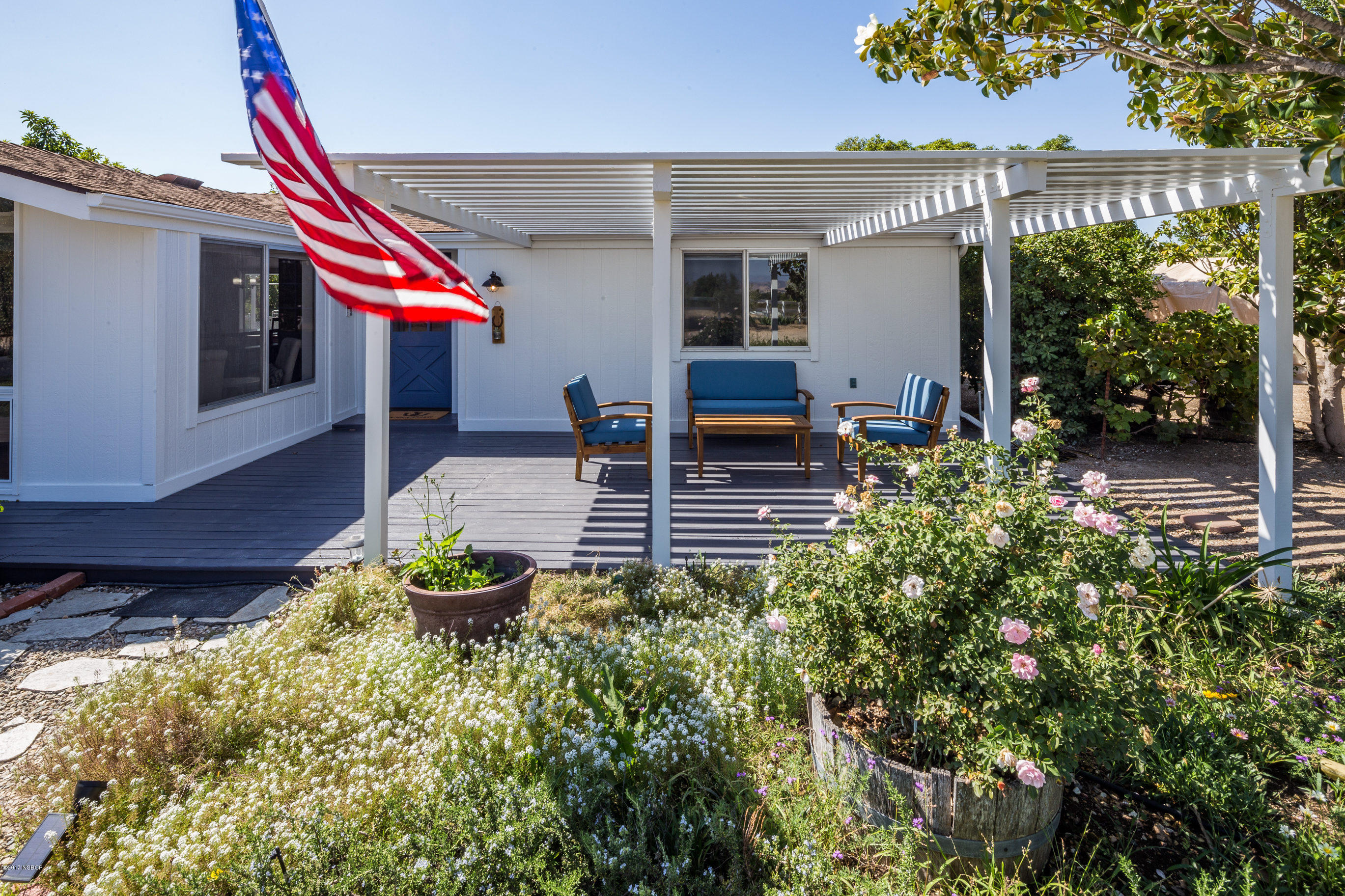 2075 North Refugio Road Santa Ynez, CA 93460 - Photo 5 of 46 a house view with a garden space