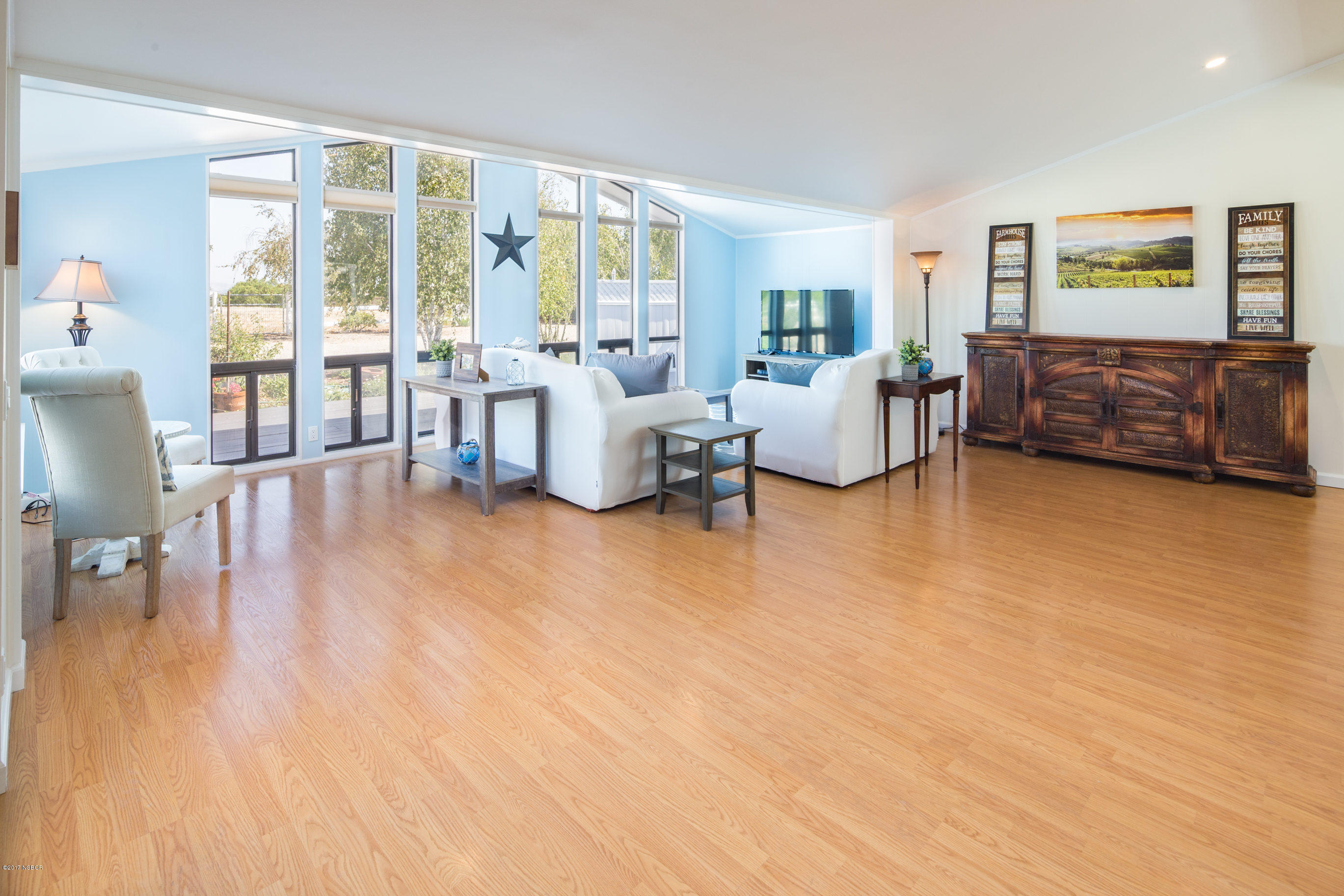 2075 North Refugio Road Santa Ynez, CA 93460 - Photo 45 of 46 a living room with furniture and a large window