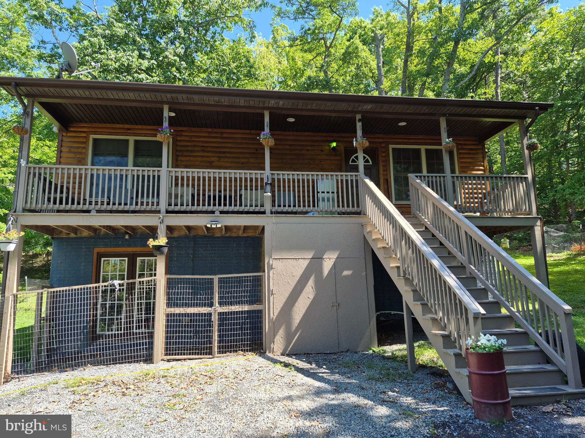 1440 Drummer Hill Road Front Royal, VA 22630 - Photo 2 of 42 a front view of house with deck