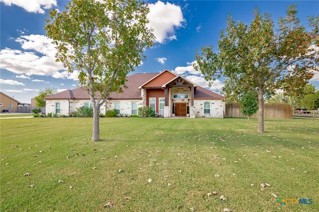 a house view with a garden space