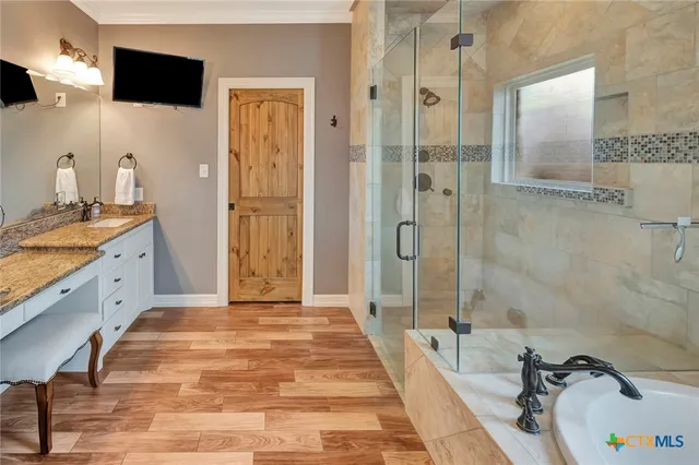 a view of swimming pool with a yard and palm trees