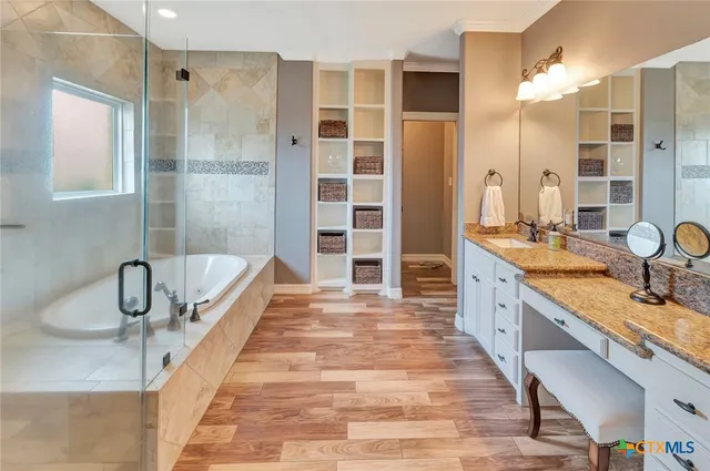 a view of a room with a door and a window