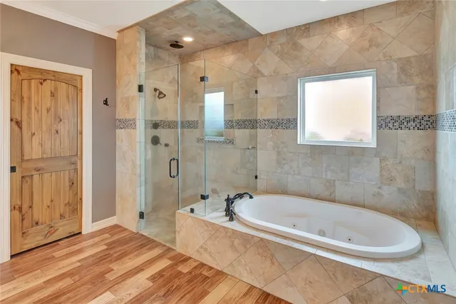 a view of a house with backyard and a garage