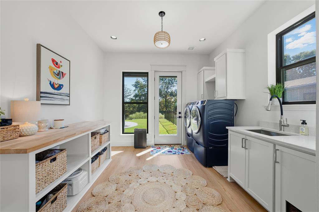 8701 Zebra Crossing Larue, TX 75770 - Photo 18 of 38 a kitchen that has a sink stove and cabinets