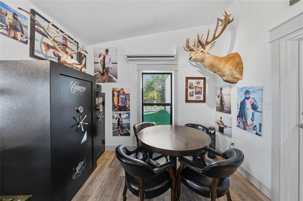 8701 Zebra Crossing Larue, TX 75770 - Photo 30 of 38 a view of a dining room with furniture and a chandelier
