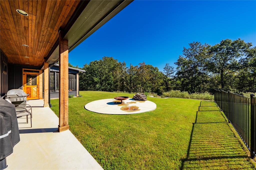 8701 Zebra Crossing Larue, TX 75770 - Photo 36 of 38 a view of a swimming pool with a patio