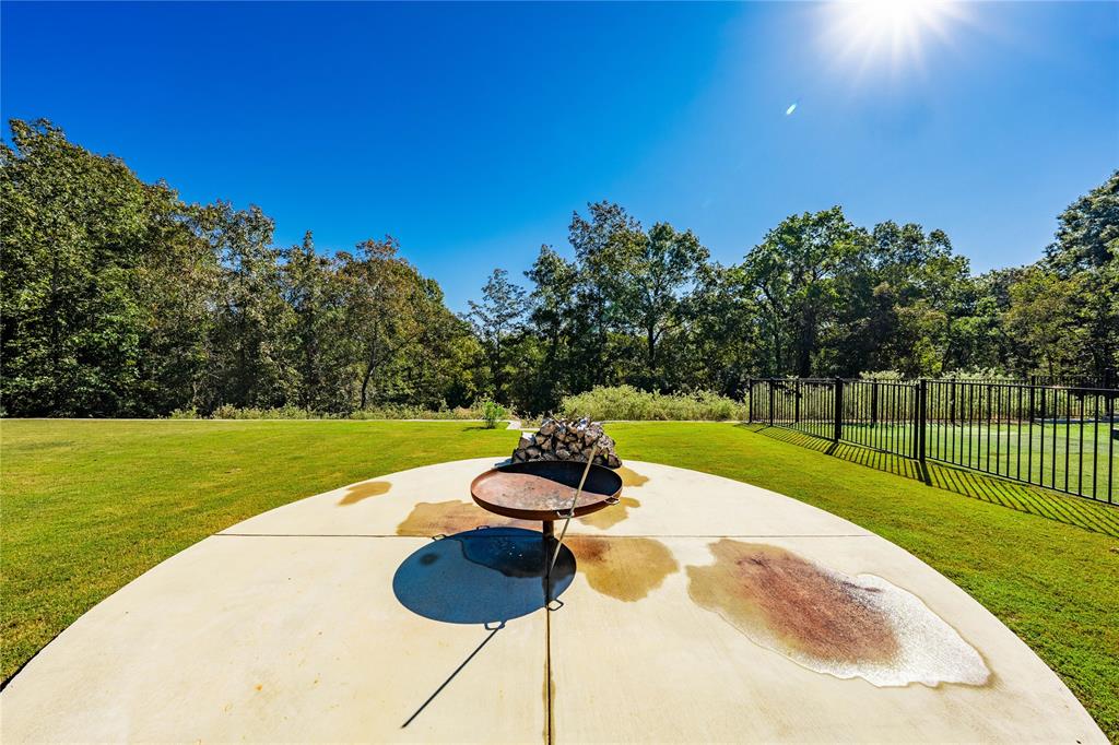 8701 Zebra Crossing Larue, TX 75770 - Photo 37 of 38 a swimming pool with wooden fence