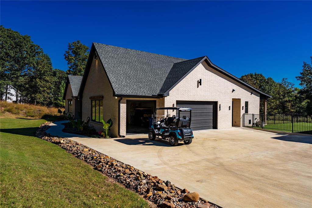 8701 Zebra Crossing Larue, TX 75770 - Photo 4 of 38 a view of a house with yard and sitting area