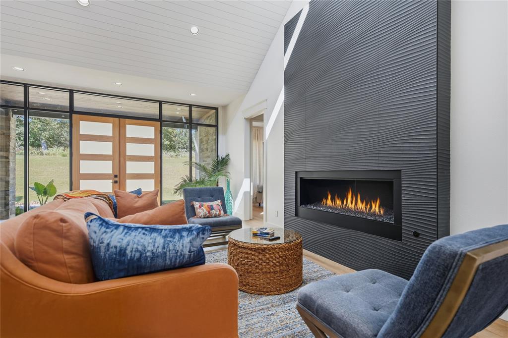 8701 Zebra Crossing Larue, TX 75770 - Photo 6 of 38 a living room with furniture and a fireplace