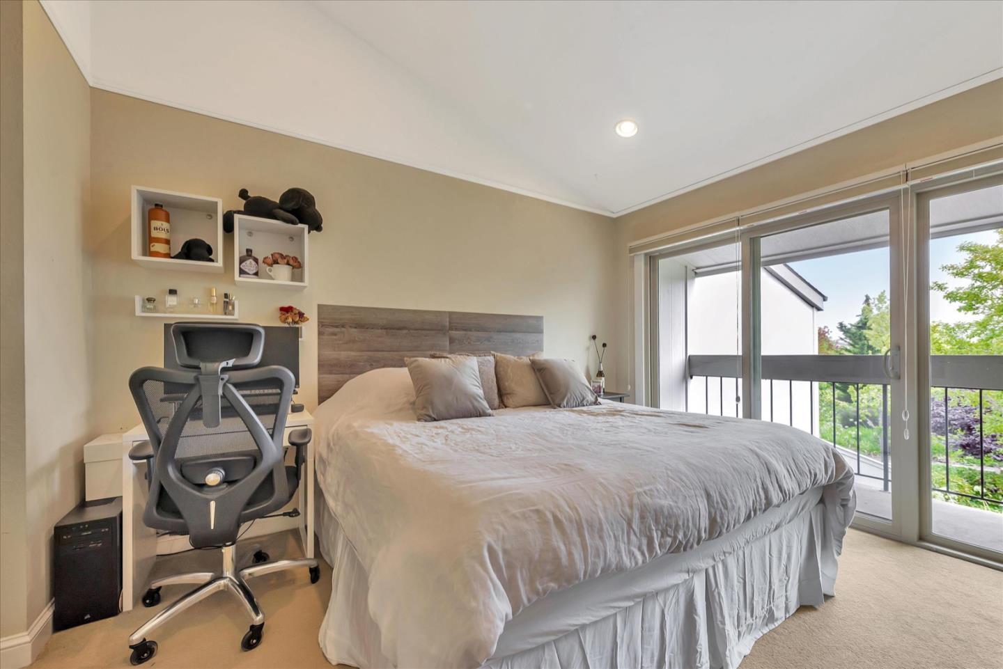 3415 La Selva Street San Mateo, CA 94403 - Photo 13 of 33 a bedroom with a bed a table and chair with the floor