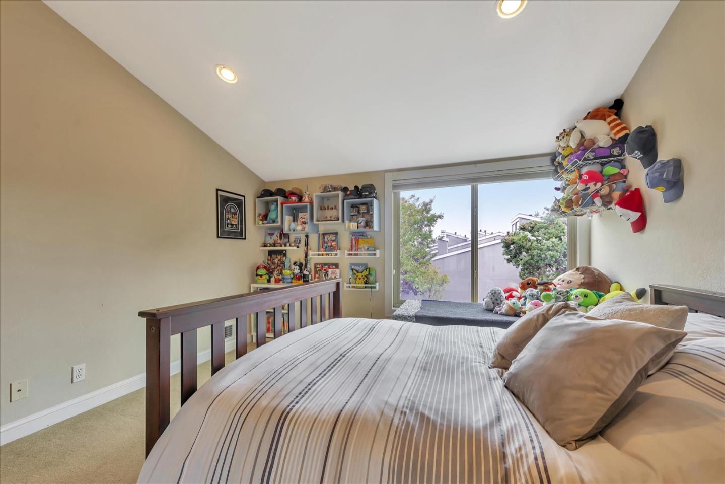3415 La Selva Street San Mateo, CA 94403 - Photo 23 of 33 a bedroom with a bed and a large window