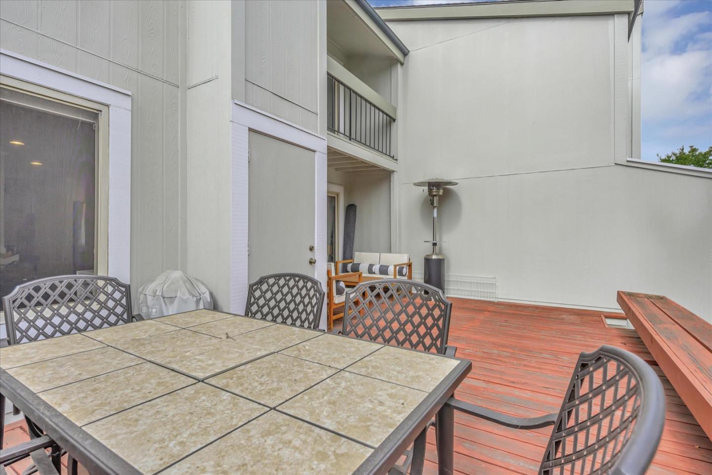 3415 La Selva Street San Mateo, CA 94403 - Photo 27 of 33 a bedroom with a bed and a table