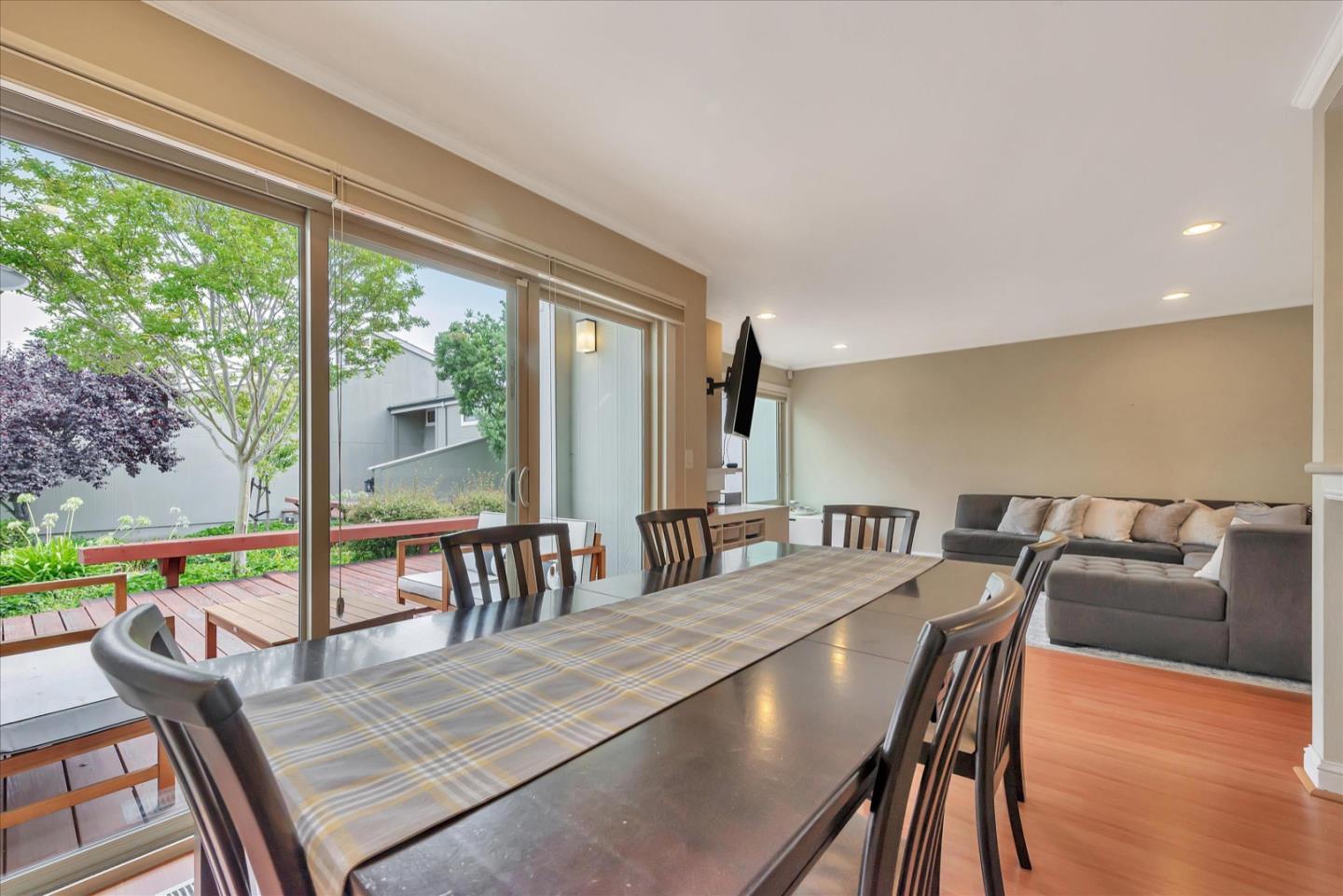3415 La Selva Street San Mateo, CA 94403 - Photo 7 of 33 a view of a dining room with furniture window and wooden floor