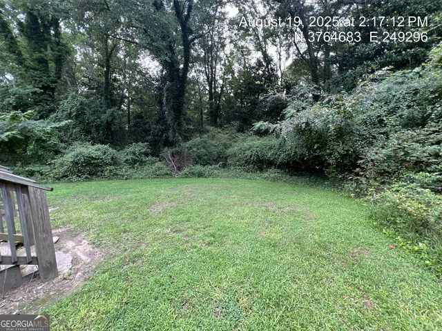 an outdoor space with garden view