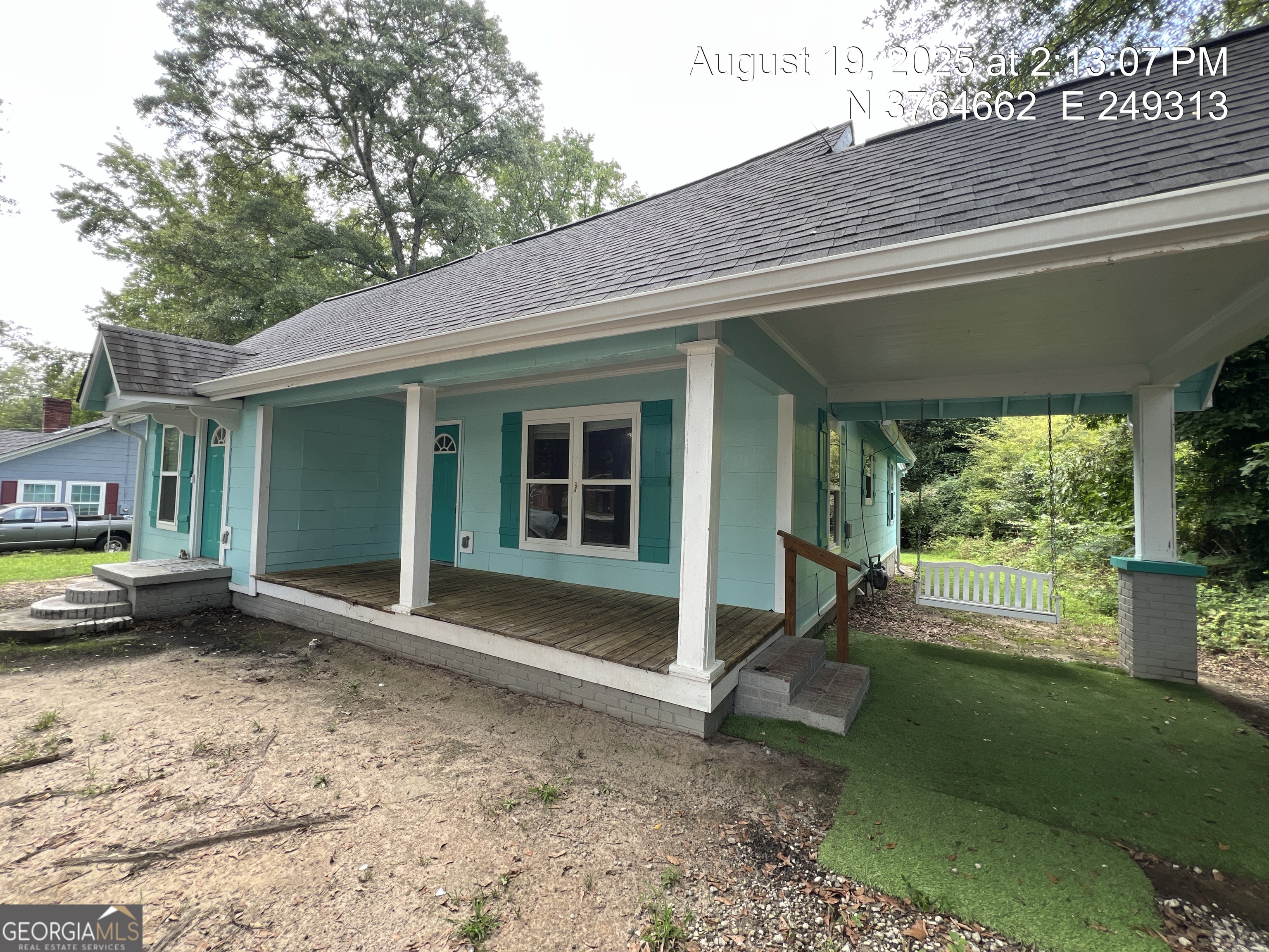 186 Georgia Avenue, Unit B Winder, GA 30680 - Photo 2 of 24 a backyard of a house with seating space