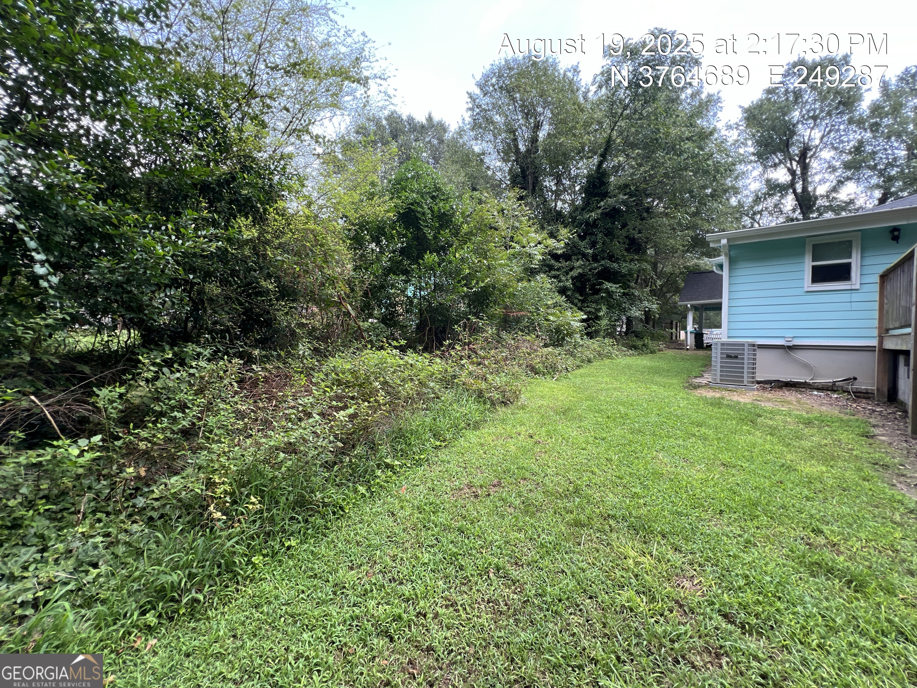 186 Georgia Avenue, Unit B Winder, GA 30680 - Photo 24 of 24 a view of a backyard with a barn