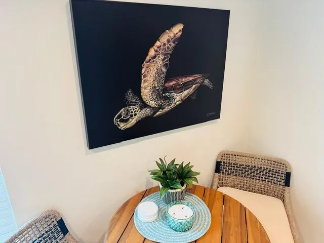 a vase of flowers sitting on a table