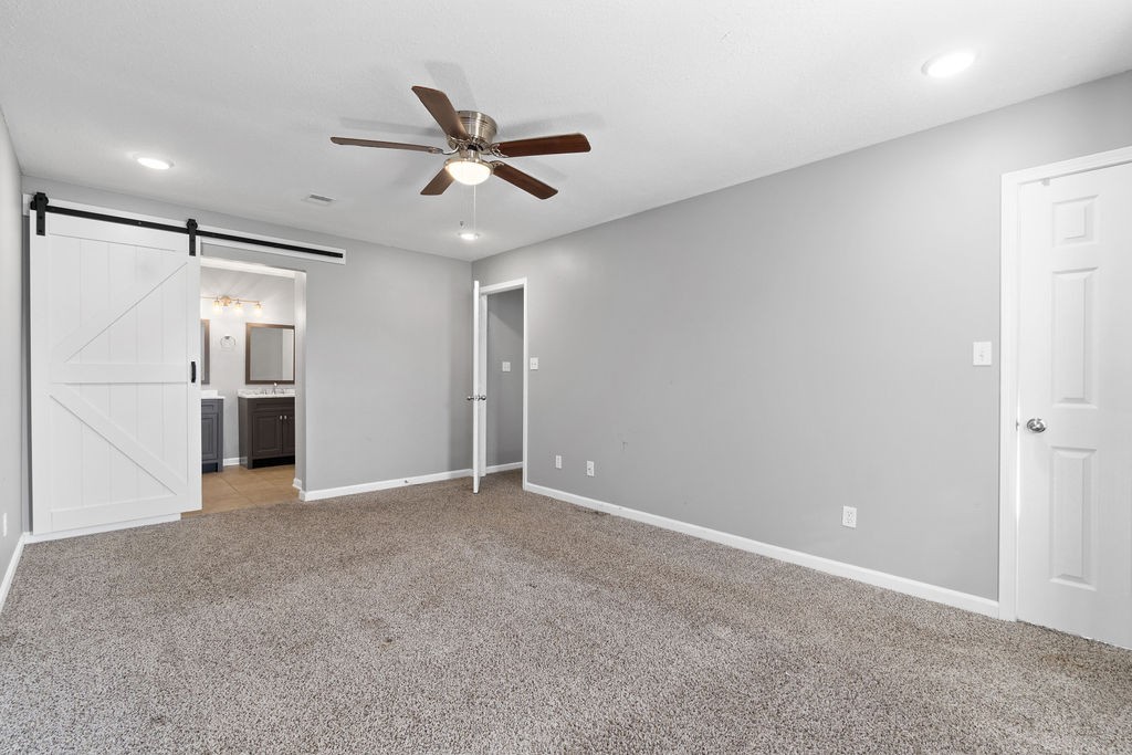 1909 Needmore Road Clarksville, TN 37042 - Photo 19 of 24 a view of an empty room with a kitchen