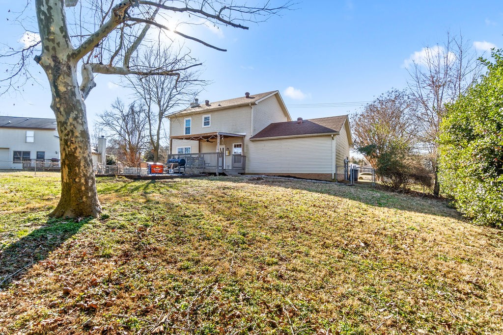 1909 Needmore Road Clarksville, TN 37042 - Photo 24 of 24 a view of a house with a yard and pathway