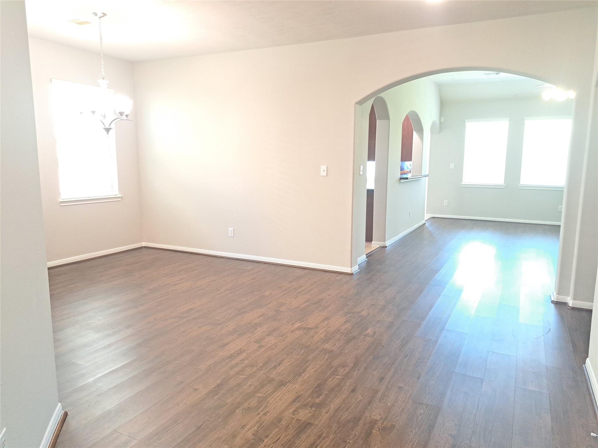 26315 Fox Ridge Lane Katy, TX 77494 - Photo 7 of 39 an empty room with wooden floor and windows