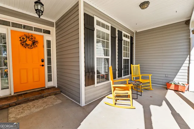 a view of swimming pool with patio