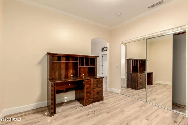 a room with furniture and natural light