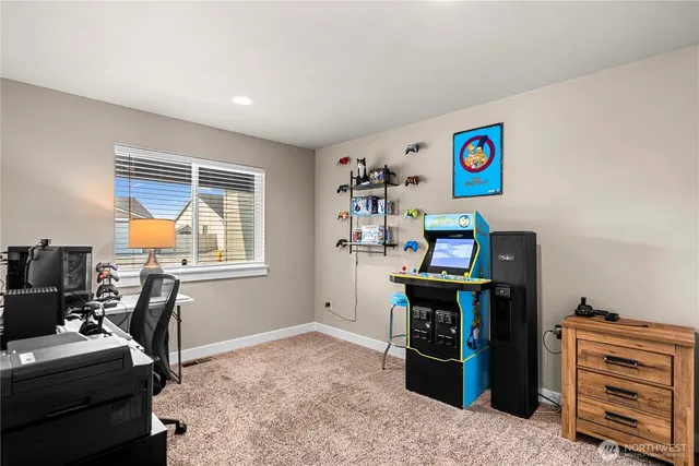 a workspace with furniture and window