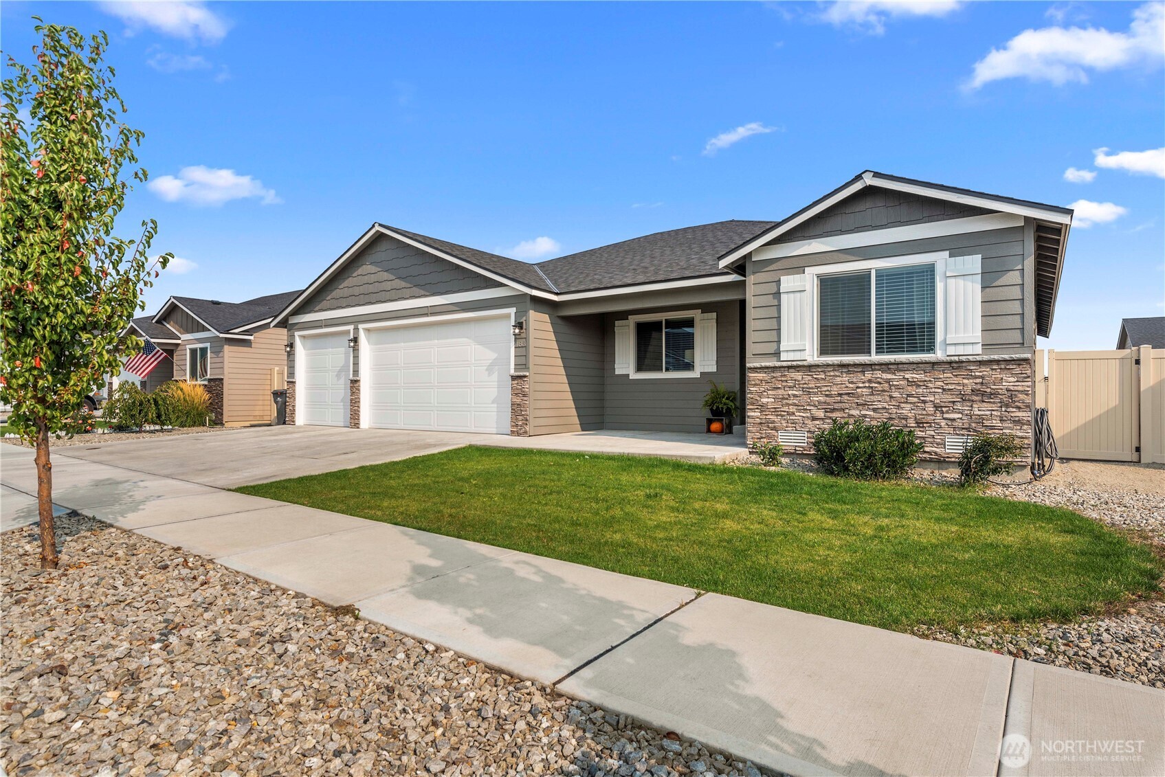 183 Emma Drive Wenatchee, WA 98801 - Photo 2 of 34 a front view of a house with a yard