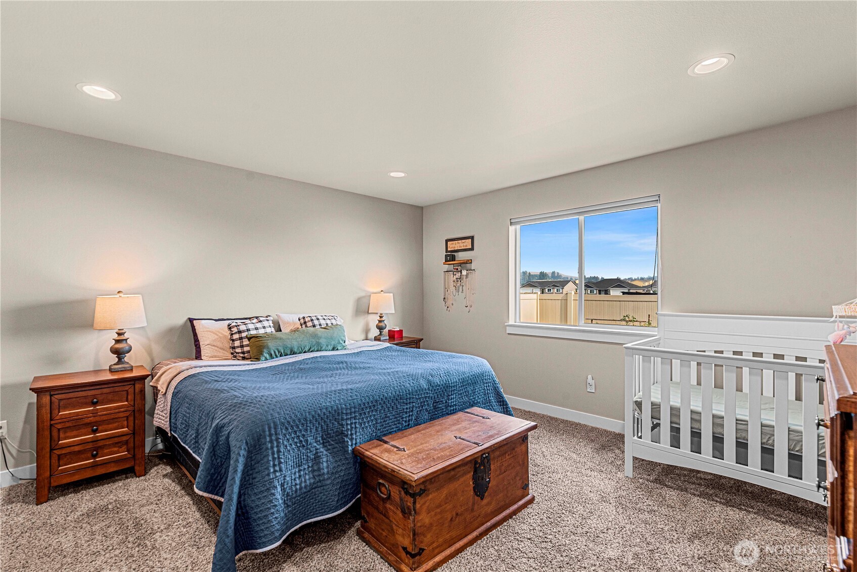 183 Emma Drive Wenatchee, WA 98801 - Photo 22 of 34 a bedroom with a bed and a window