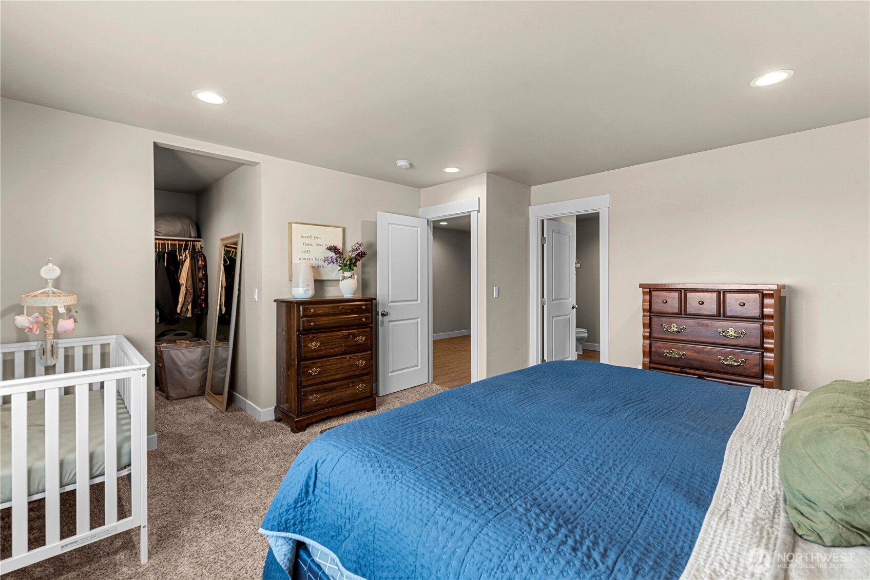 183 Emma Drive Wenatchee, WA 98801 - Photo 24 of 34 a bedroom with a bed and a television