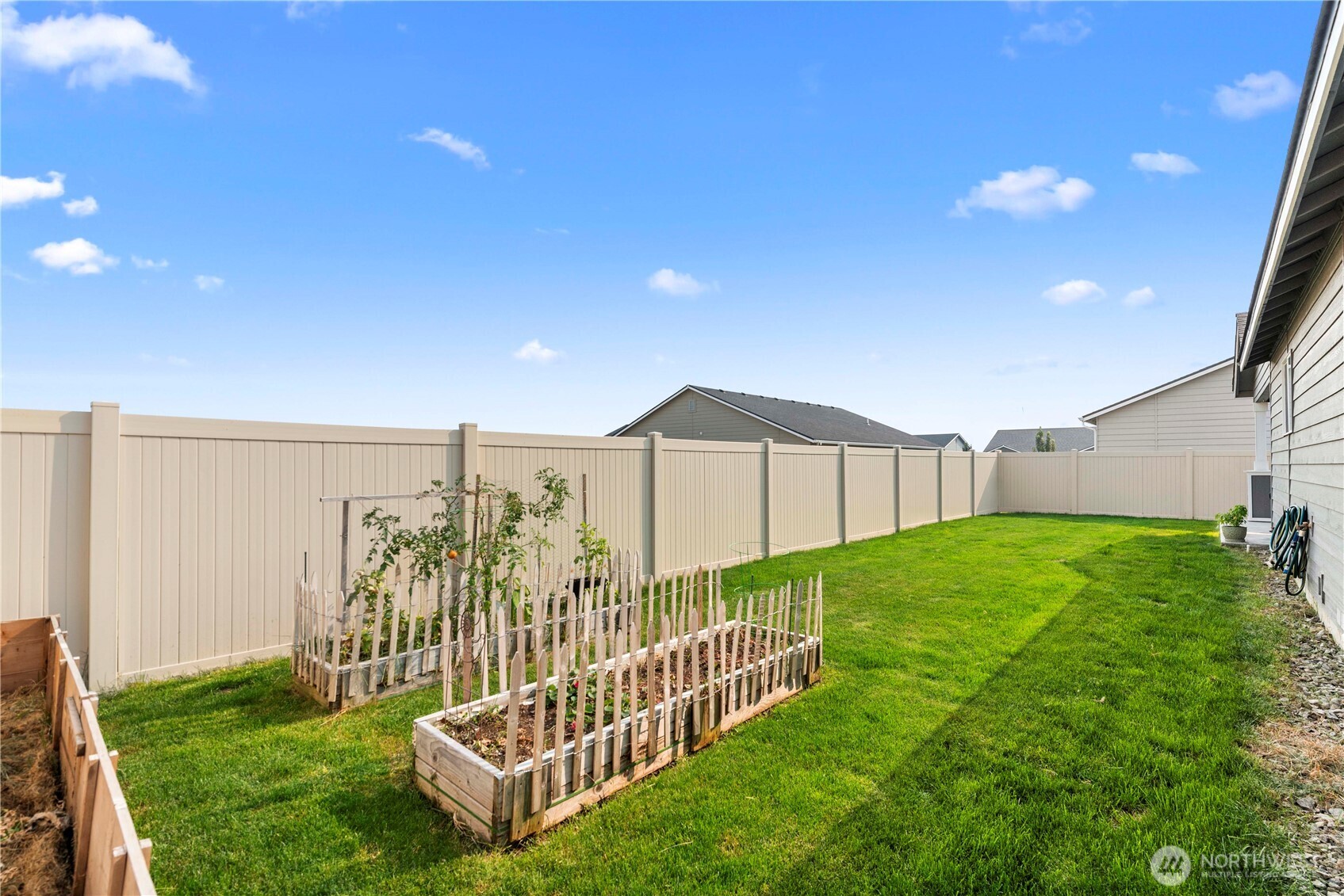 183 Emma Drive Wenatchee, WA 98801 - Photo 31 of 34 a view of a backyard with garden