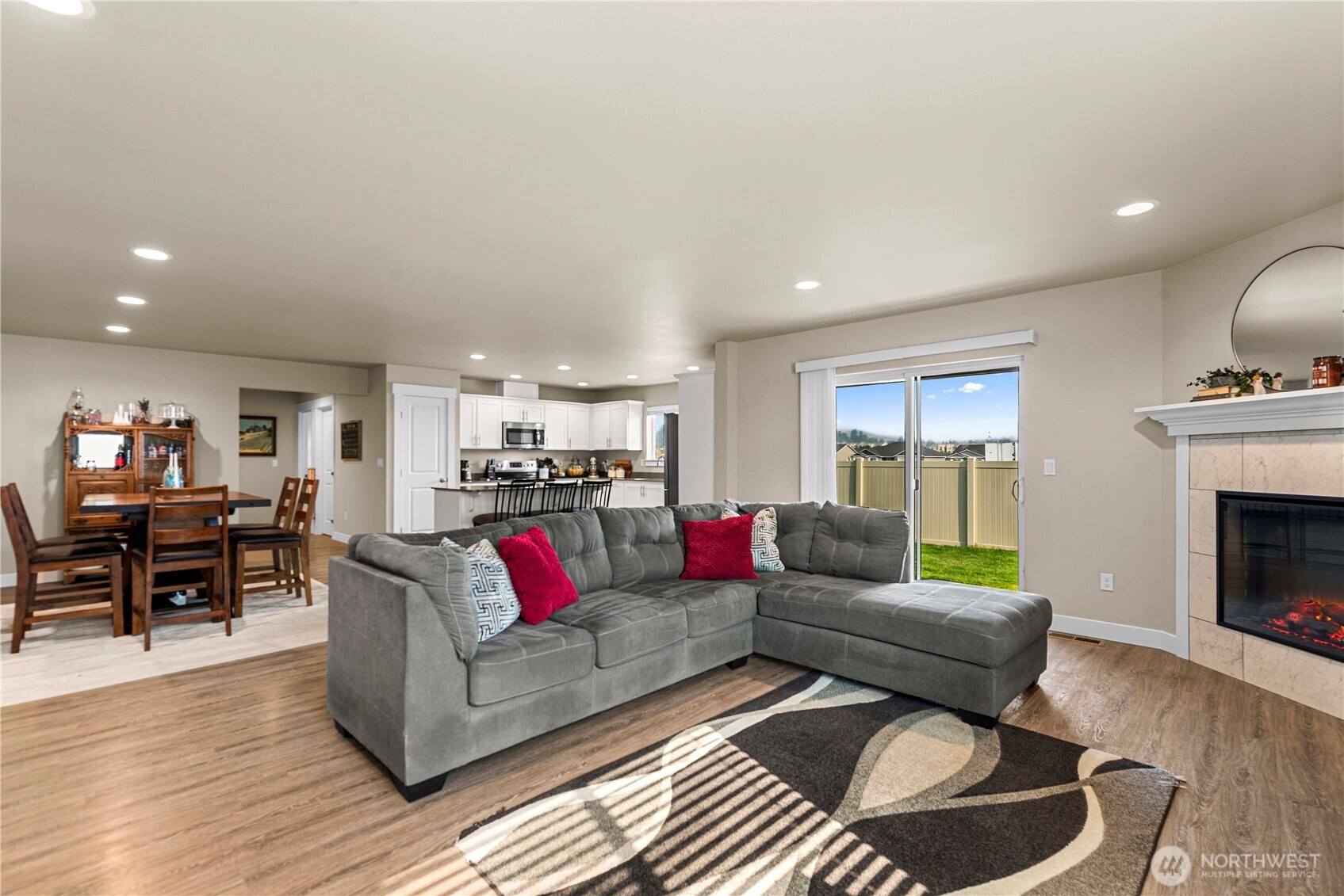 183 Emma Drive Wenatchee, WA 98801 - Photo 5 of 34 a living room with furniture and a fireplace
