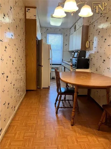 a view of a dining room with furniture
