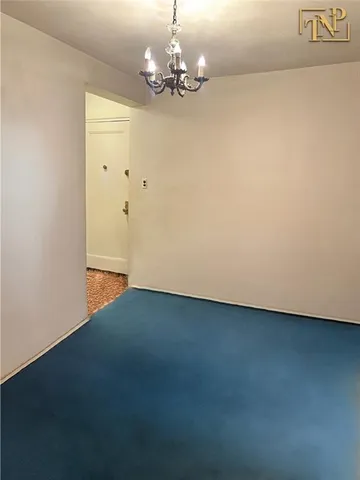 a view of a chandelier in big room