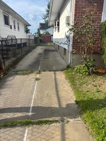 a view of a street in front of a building