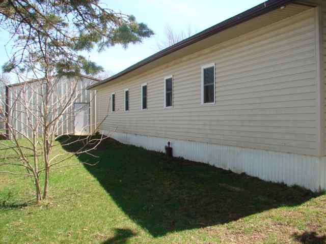 309 Jefferson Street Ridott, IL 61067 - Photo 10 of 12 a backyard of a house