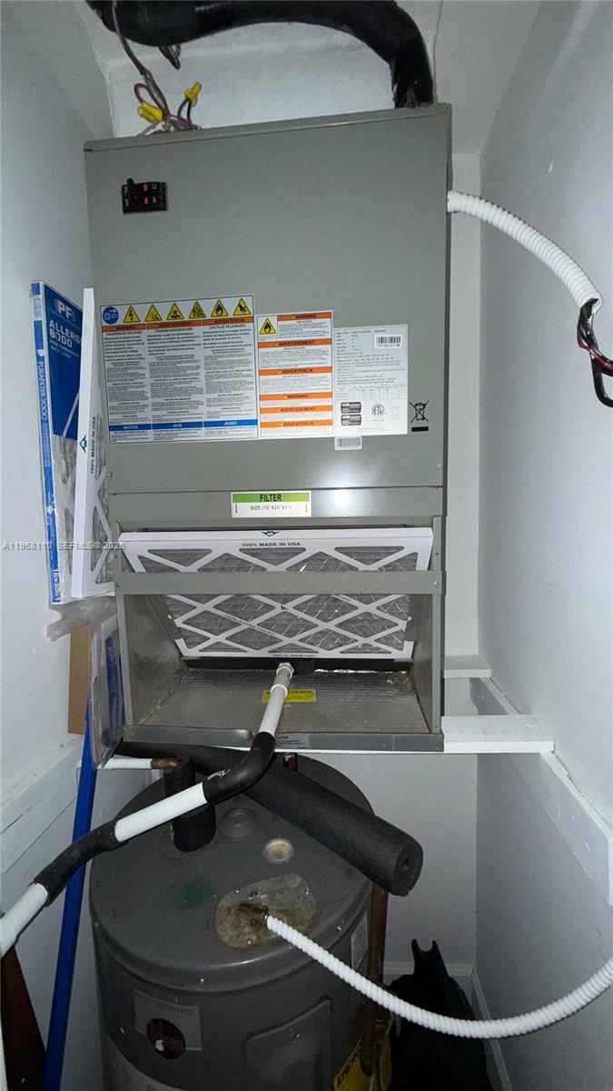 1075 West 68th Street, Unit 403 Hialeah, FL 33014 - Photo 20 of 25 a close view of stove