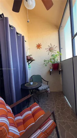 a bed room with furniture and a window