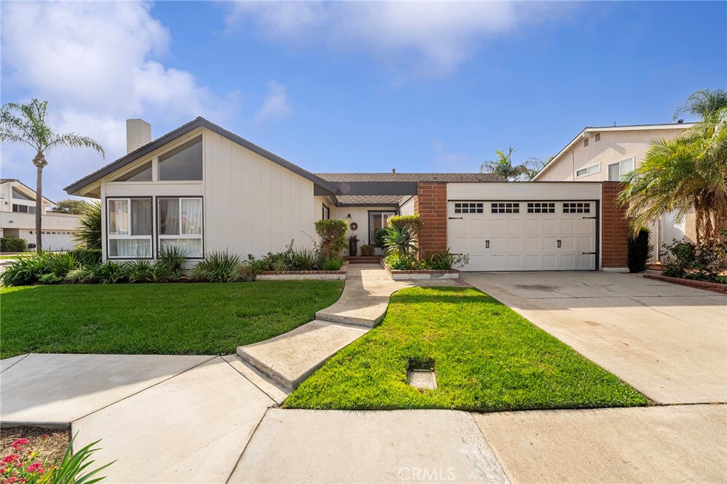 4326 Via Verde Cypress, CA 90630 - Photo 1 of 43 a front view of a house with a yard and garage