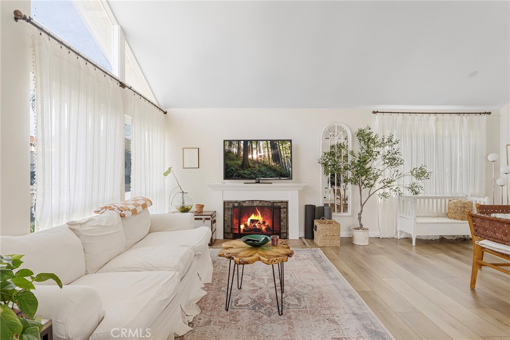 4326 Via Verde Cypress, CA 90630 - Photo 13 of 43 a living room with furniture and a fireplace