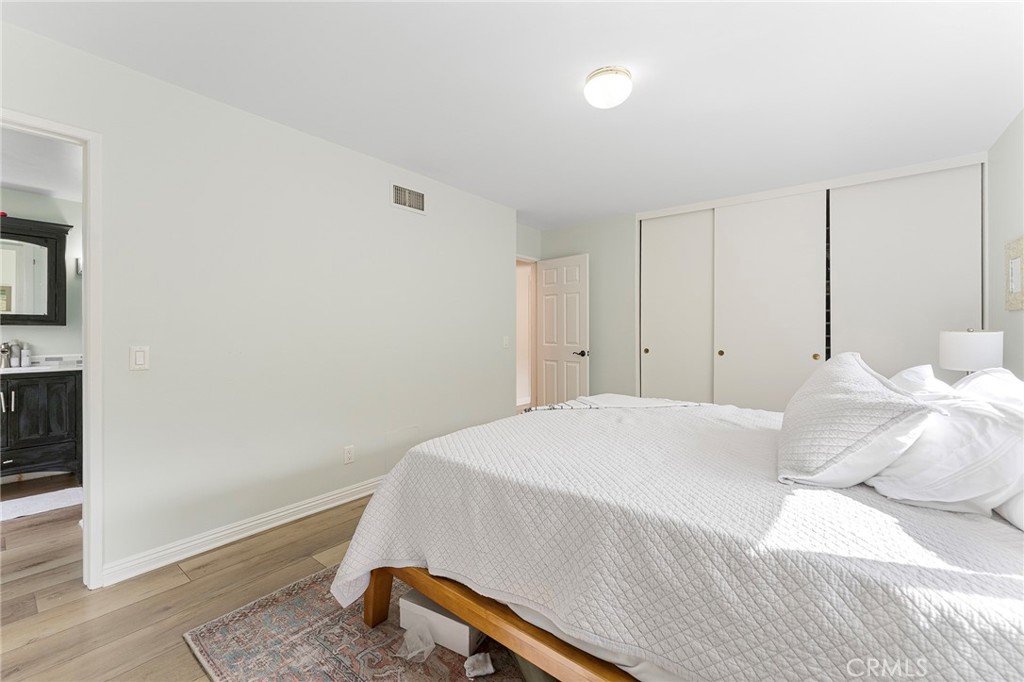 4326 Via Verde Cypress, CA 90630 - Photo 24 of 43 a bedroom with a bed and a tv