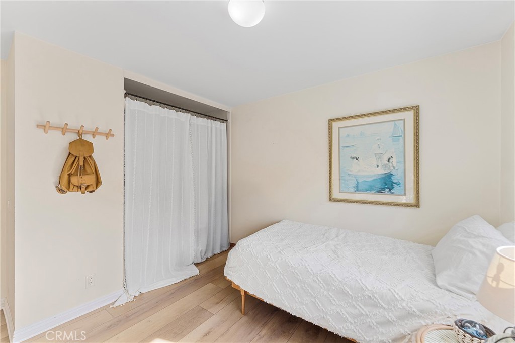 4326 Via Verde Cypress, CA 90630 - Photo 28 of 43 a bedroom with a bed and painting on the wall