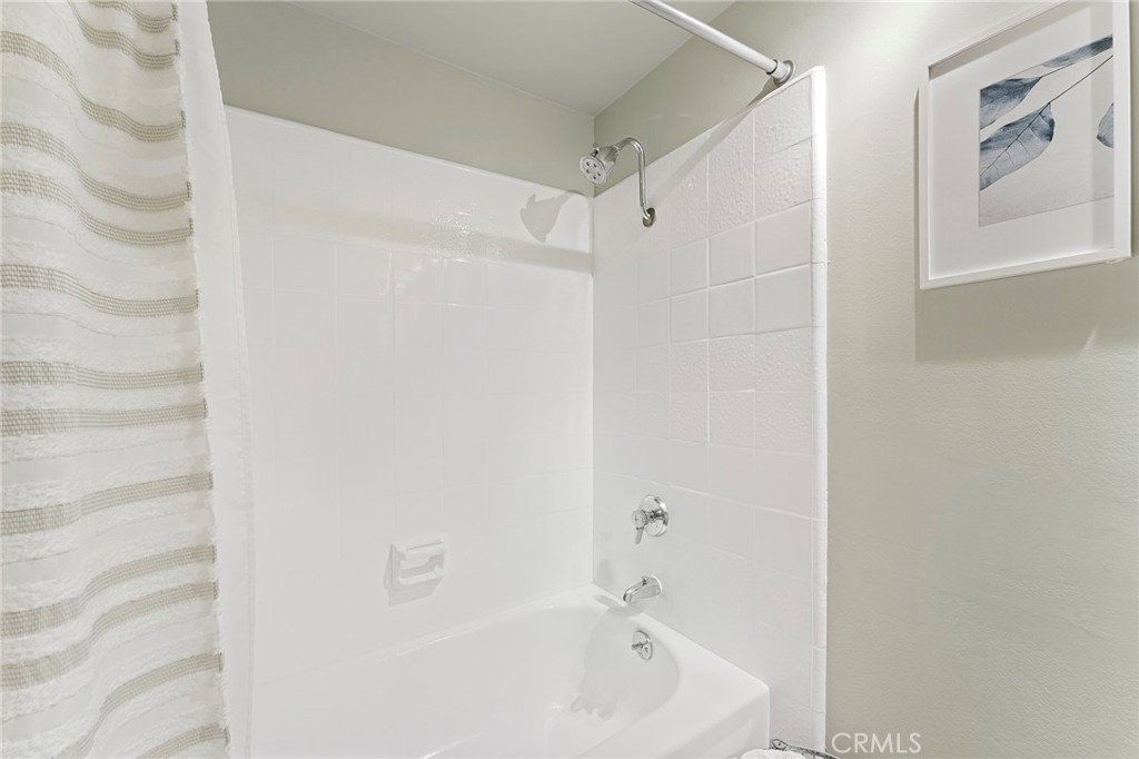 4326 Via Verde Cypress, CA 90630 - Photo 30 of 43 a bathroom with a bathtub and a shower